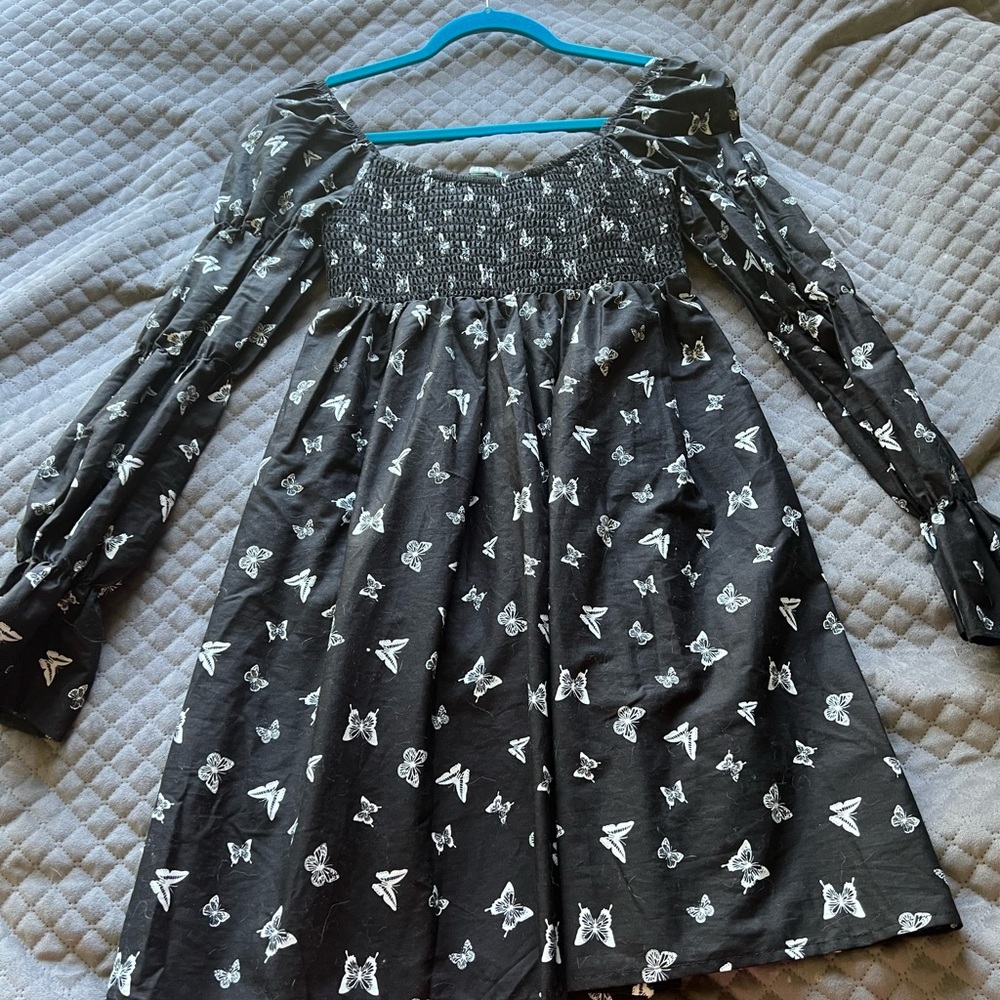 Black target dress with white butterfly’s